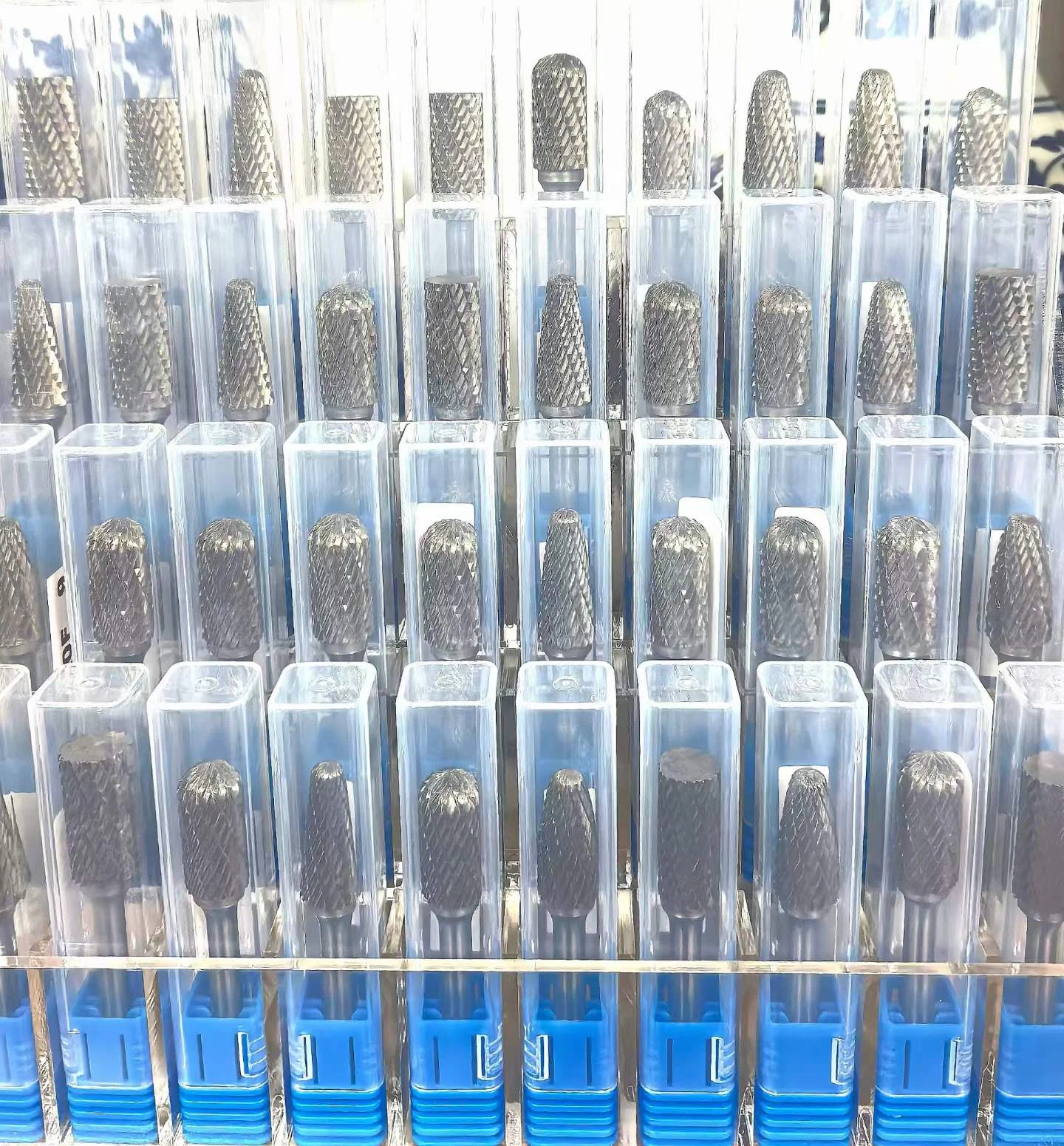 Individual carbide burrs in clear plastic unit packaging