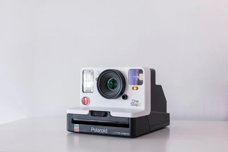 Polaroid camera product flat lay photo